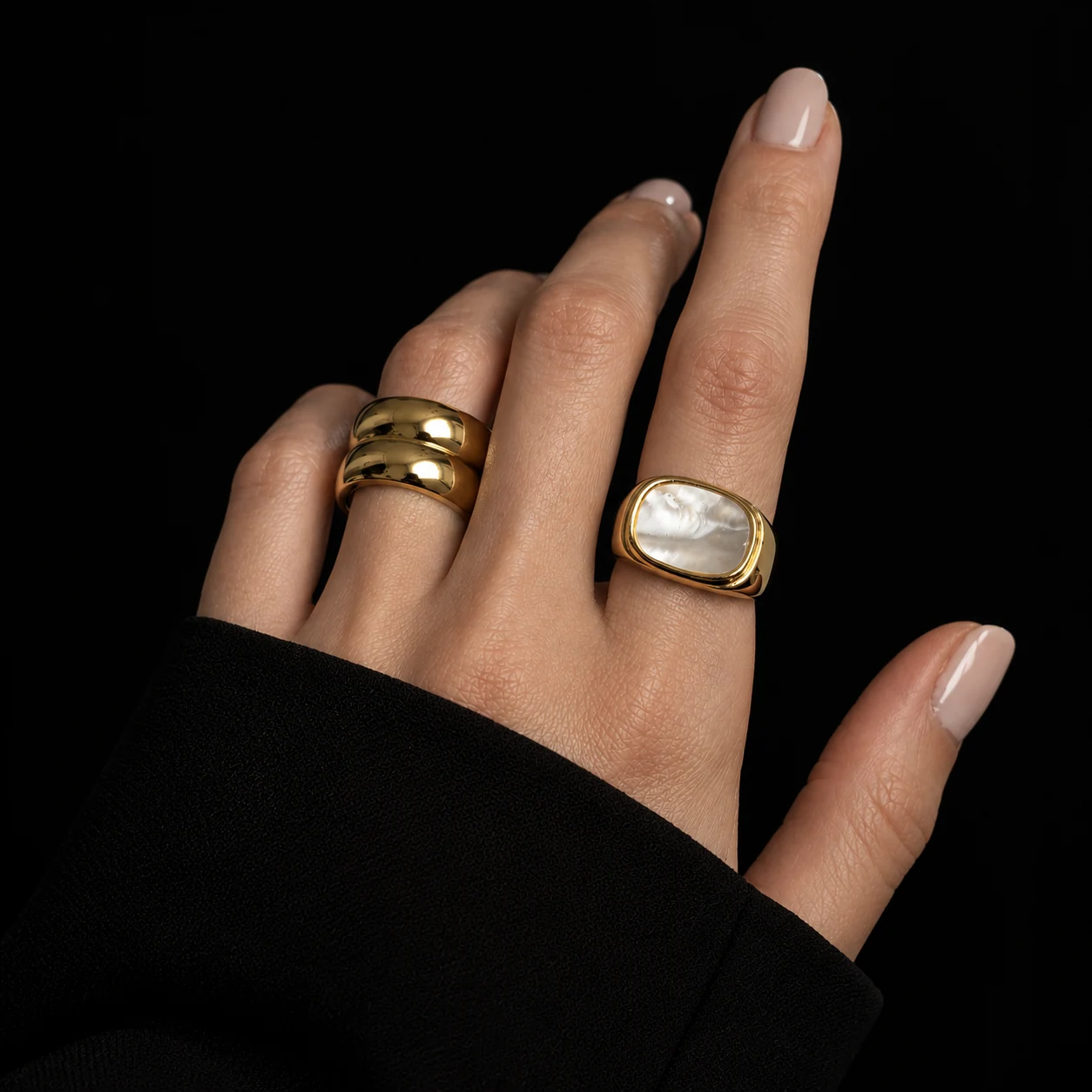 Gilded Hand Against Black
